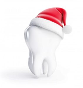 a tooth wearing a Santa Claus hat